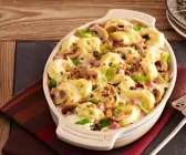 Tortellini-Auflauf mit Schinken und Frühlingszwiebeln